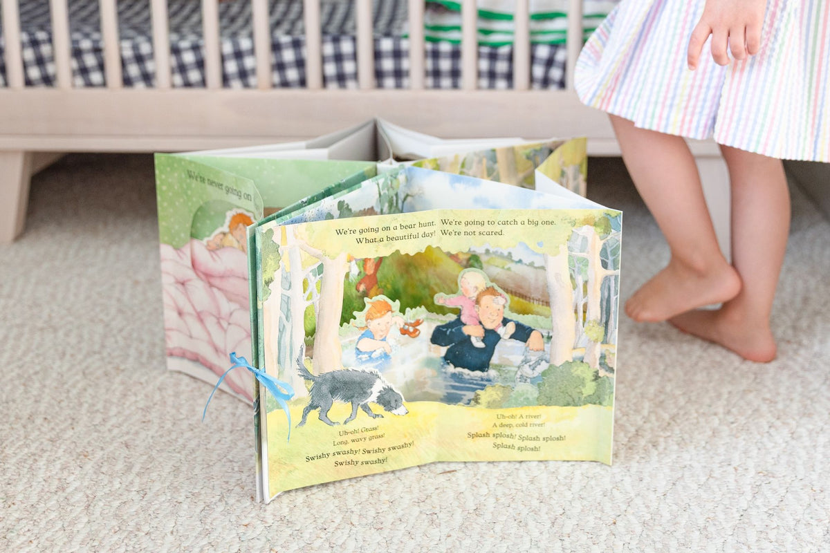 We're Going on a Bear Hunt Pop-Up Carousel Book: (An Interactive Peep-Through Gift Edition with Layered Scenes and Ribbon Tie for Kids Ages 3-7)