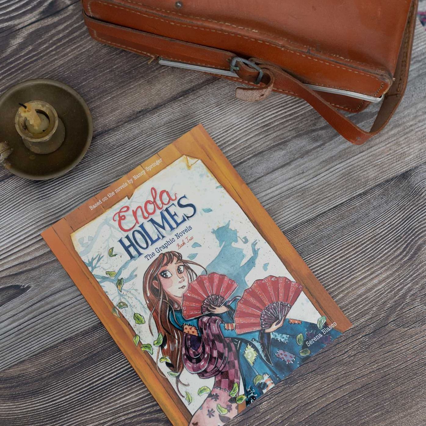 Enola Holmes: The Graphic Novels, Book Two: The Case of the Peculiar Pink Fan, The Case of the Cryptic Crinoline, and The Case of Baker Street Station