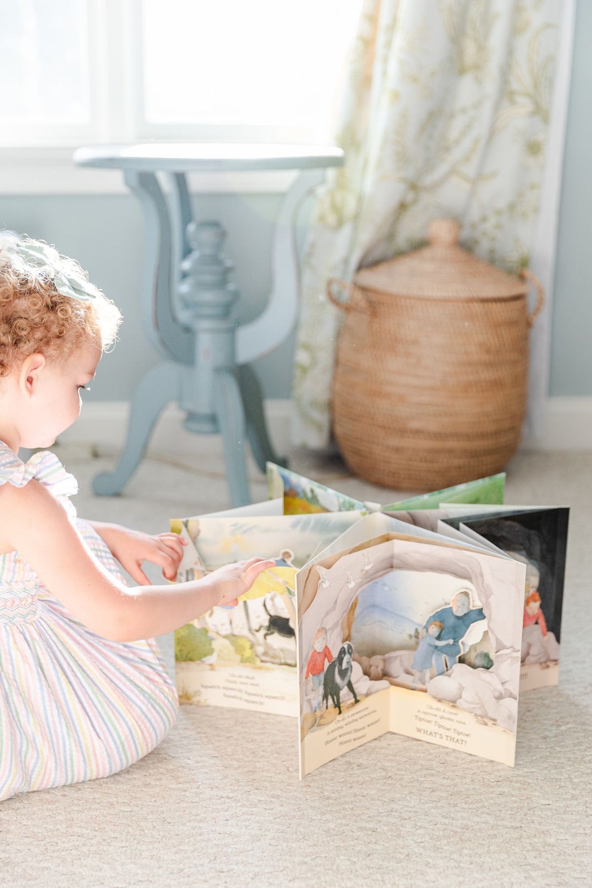 We're Going on a Bear Hunt Pop-Up Carousel Book: (An Interactive Peep-Through Gift Edition with Layered Scenes and Ribbon Tie for Kids Ages 3-7)